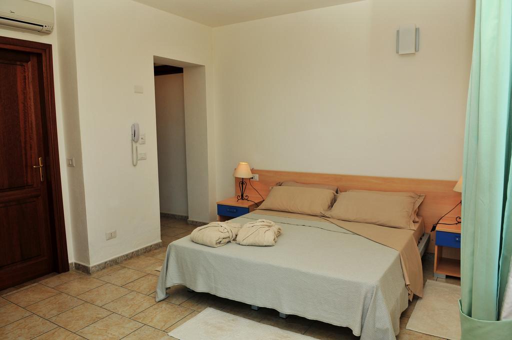Hotel Castello Budoni Szoba fotó
